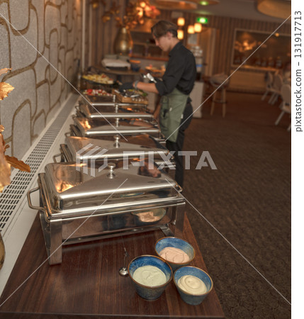 Selective focus. Row of Chafing Dishes at Event Buffet 131917713