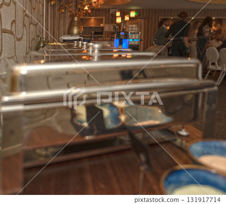 Selective focus. Row of Chafing Dishes at Event Buffet 131917714