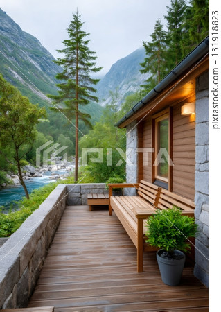 Cozy cabin patio overlooking mountain river landscape 131918823