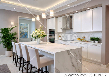 Modern kitchen interior featuring luxury marble island design 131919107