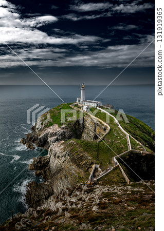 South Stack Island At The Atlantic Coast With South Stack Lighthouse And View To The Irish Sea In North Wales, United Kingdom South Stack Island At The Atlantic Coast With South Stack Lighthouse And View To The Irish Sea In North Wales, United Kingdom 131919365