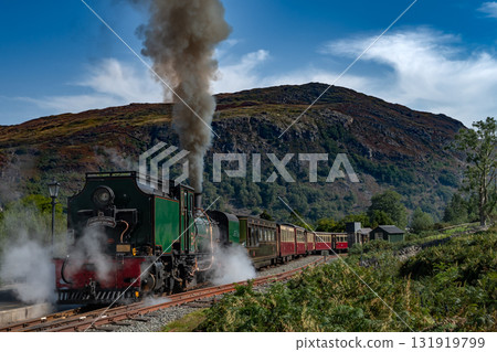 Old Train With Steam Locomotive At Beddgelert Train Station In Snowdonia National Park In Wales, United Kingdom Old Train With Steam Locomotive At Beddgelert Train Station In Snowdonia National Park In Wales, United Kingdom 131919799