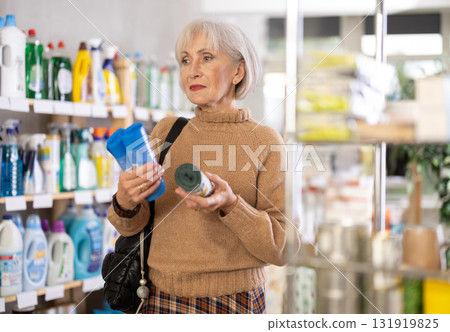 customer chooses garbage bags 131919825