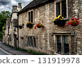 Picturesque Village Castle Combe In The Cotswolds Area In Wiltshire In England, United Kingdom 131919978