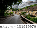 Picturesque Village Castle Combe In The Cotswolds Area In Wiltshire In England, United Kingdom 131919979