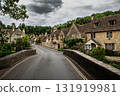 Picturesque Village Castle Combe In The Cotswolds Area In Wiltshire In England, United Kingdom 131919981