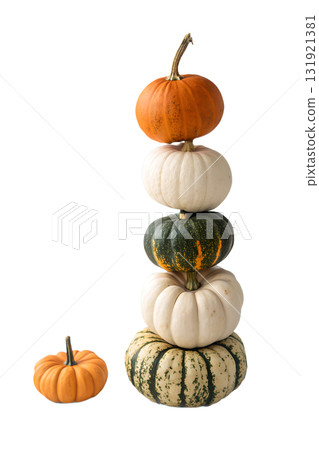 Stack of colorful pumpkins in orange, white and green, autumn harvest arrangement isolated on transparent background 131921381