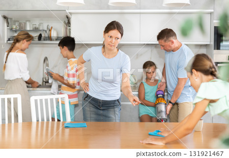 Big family members cleaning their house Big family members cleaning their house 131921467