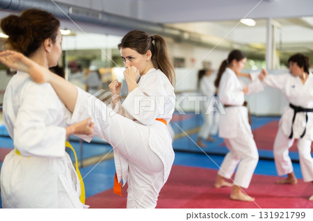 Women in kimonos do karate 131921799