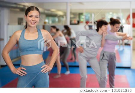Woman training in the gym Woman training in the gym 131921853