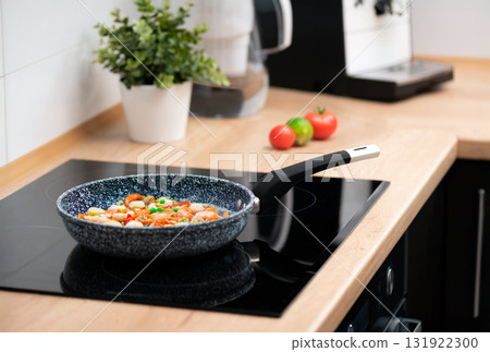 Cooking fresh vegetables in a pan 131922300
