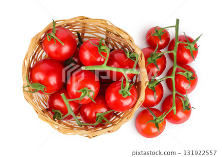 Cherry tomato bunch in a wicker basket isolated on white background. Top view. Flat lay 131922557
