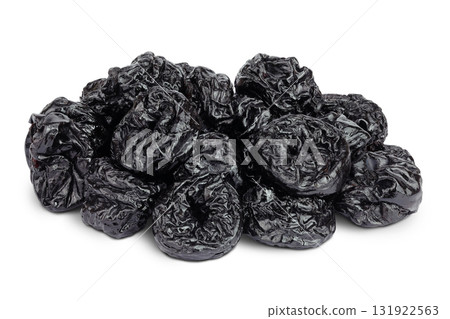 Prunes isolated on white background, heap of dried plums Prunes isolated on white background, heap of dried plums 131922563