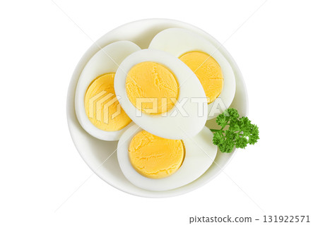 Boiled chicken egg in ceramic bowl isolated on white background. Top view. Flat lay Boiled chicken egg in ceramic bowl isolated on white background. Top view. Flat lay 131922571