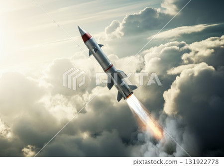 Rocket launching through clouds with vibrant flames and dramatic sky in a visualelectric din 131922778