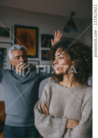 An Intense but Meaningful Family Discussion is Happening Between Father and Daughter in a Cozy Setting 131923621