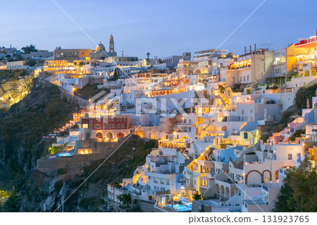 Evening lights of hillside buildings in Fira, Santorini, Greece 131923765