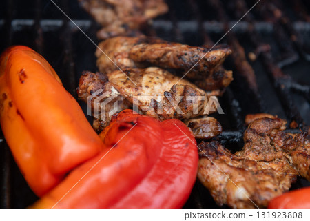 Grilled Chicken and Red Peppers on a Summer Barbecue Grilled Chicken and Red Peppers on a Summer Barbecue 131923808