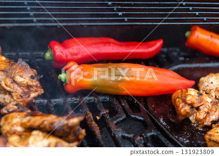 Grilled Chicken and Red Peppers on a Summer Barbecue Grilled Chicken and Red Peppers on a Summer Barbecue 131923809