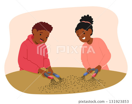 Girl and boy classmates studying magnetic field lines during physics science lesson at school scene 131923853