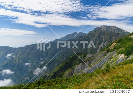 Spectacular mountain ranges seen from Mt. Karamatsu in the Northern Alps in early autumn (Mt. Goryu) 131924067