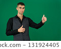 Set of videos with handsome European businessman in classic suit vest and black shirt showing different emotions gestures and confident poses on green chroma key background with copy space 131924405