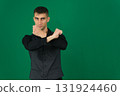 Set of videos with handsome European businessman in classic suit vest and black shirt showing different emotions gestures and confident poses on green chroma key background with copy space 131924460