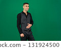 Set of videos with handsome European businessman in classic suit vest and black shirt showing different emotions gestures and confident poses on green chroma key background with copy space 131924500