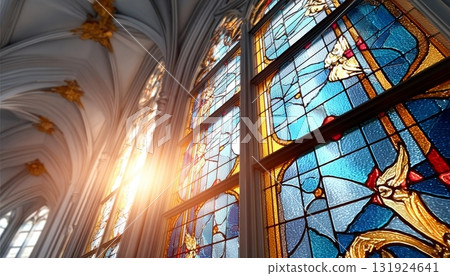 Sunlit Radiance Through Stained Glass Windows in a Gothic Church Evokes a Spiritual Worship Mood 131924641