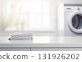Mockup for design of empty white table in laundry room created with ai generative tools. 131926202