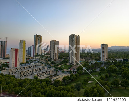 The Stunning Urban Skyline at Sunset is beautifully complemented by Lush Greenery all around 131926303