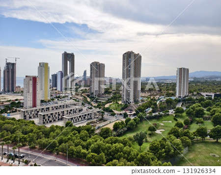 Exploring a Modern Urban Landscape Featuring Lush Green Spaces Interspersed with Skyscrapers Exploring a Modern Urban Landscape Featuring Lush Green Spaces Interspersed with Skyscrapers 131926334