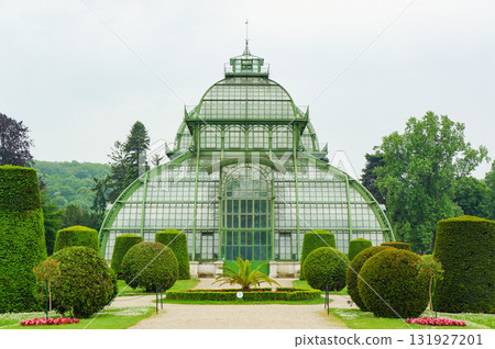 A historic greenhouse building located next to Schönbrunn Palace 131927201