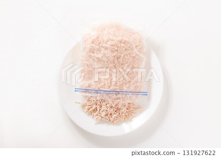 Frozen ground chicken breast 131927622