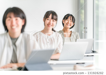 Elementary school children studying at cram schools, after-school programs, attending classes at school, and taking summer courses (Education) 131928282