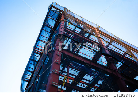 Steel frame and protective curtain under construction a-2 High saturation contrast 131928489