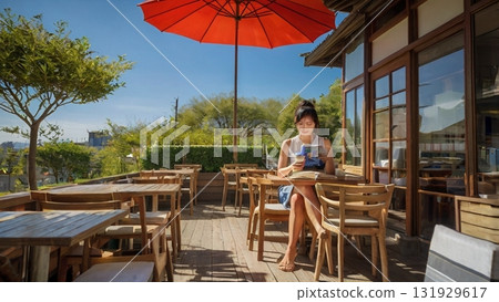 Enjoy a fantastic and relaxing time reading and drinking coffee at an open cafe 131929617