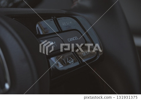 interior view of car with black leather, close up steering wheel with button interior view of car with black leather, close up steering wheel with button 131931375