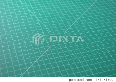 green cutting mat board background with line and scale measure guide pattern for object art design green cutting mat board background with line and scale measure guide pattern for object art design 131931399