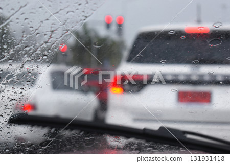 car on highway road with rainny season, blurred image car on highway road with rainny season, blurred image 131931418