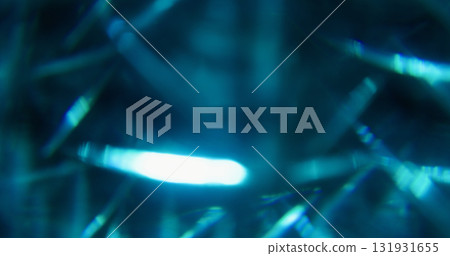 Defocused optical glow. Radiant light. Cold blue color glare shadow glisten reflection on visual illuminated bright art abstraction. 131931655