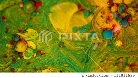 Bubbles stream. Oil drop. Defocused green yellow blue colorful paint fluid round mix water emulsion floating on abstract art background. 131931689