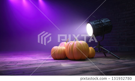Brightly lit pumpkins sit on a wooden floor under purple stage lights during a festive autumn gathering 131932780