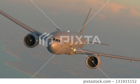 High-performance aircraft flying over coastal landscape during sunset with glowing sky and city in the background 131933152