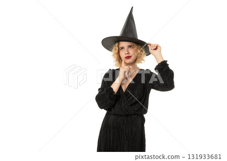 Woman in black dress and witch hat for Halloween, isolated, PNG Woman in black dress and witch hat for Halloween, isolated, PNG 131933681