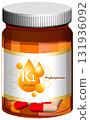 Vitamin K1 Supplement Bottle with Capsules Vector Illustration 131936092