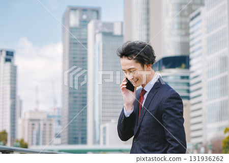 Businessman making a phone call on a smartphone 131936262