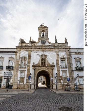The most famous Arco da Vila, the historic entrance to the old town of Faro, Algarve, Portugal The most famous Arco da Vila, the historic entrance to the old town of Faro, Algarve, Portugal 131936371