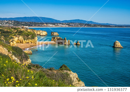 Ponta da Piedade is a unique rock formation with famous grottos in the ocean at Lagos, Algrave, Portugal 131936377