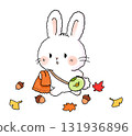 A rabbit having a fun autumn walk among the fallen leaves 131936896